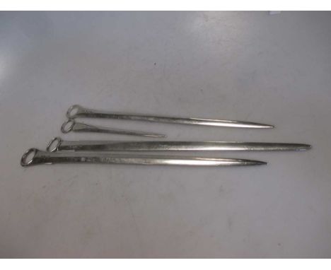 A collection of three silver meat skewers together with a silver game skewer, 8.3ozt gross (4)