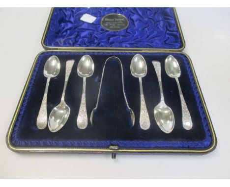 A set of six Edwardian silver teaspoons with sugar nips (cased)
