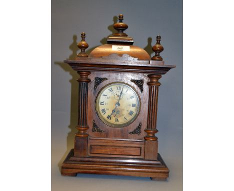 A mahogany cased mantel clock