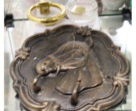 A cast metal horse plaque, a brass door knocker, a boxed wine set and a cut glass bowl 