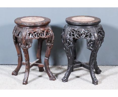 A Pair of Late 19th Century Chinese Rosewood Circular Jardiniere Stands, inset with circular pink veined marble panels, the a