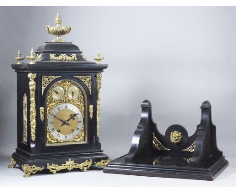 A Late 19th Century German Ebonised and Gilt Brass Mounted Bracket Clock, by Winterhalder &amp; Hofmeier, the arched brass di