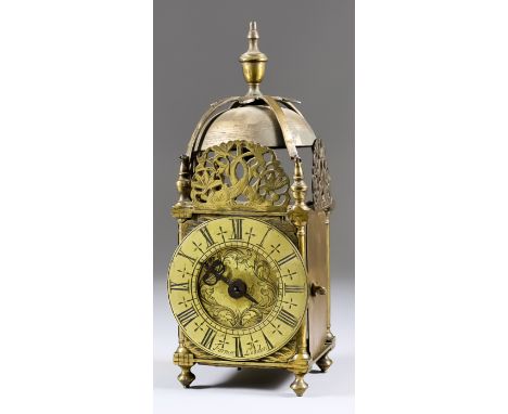 A Brass Cased Lantern Style Mantel Clock of "17th Century" Design, the 3.75ins diameter brass chapter ring with Roman numeral