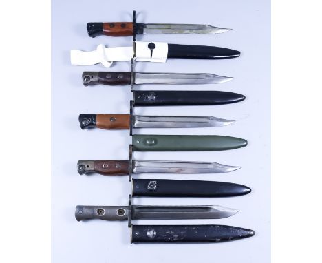 Nine Mid to Late 20th Century Bayonets, various, each with scabbard