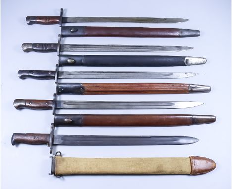 An Unusual 1918 American Bayonet, 17ins blackened steel blade, blackened steel pommel and cross guard, hardwood grips, fitted