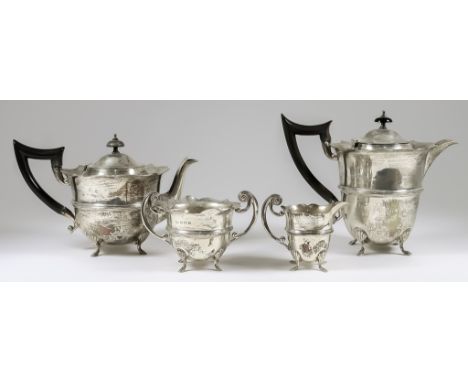 An Edward VII Silver Four-Piece Tea Service, by William Aitken, Birmingham 1908, the circular bodies with shaped rims and mou