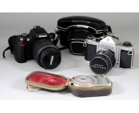 A Nikon D60 Digital Camera with Nikon DX 18-55mm Lens, an Asahi Pentax S1a 35mm SLR camera, No. 1650497, a Weston Master V li