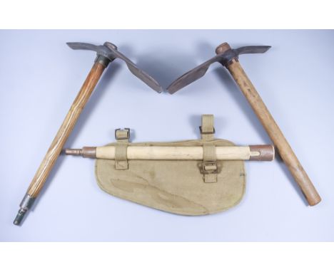 Thirteen Trenching Tools, and one spare handle with canvas holder, the interior with ink stamp - "M. E. Co. 1943"