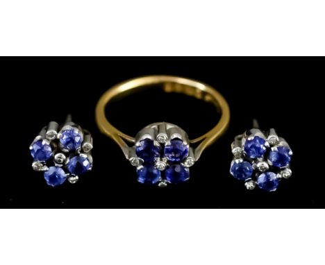 A Sapphire and Diamond Flower Head Ring, 20th Century, in 22ct gold and white metal mount, set with four sapphires, approxima