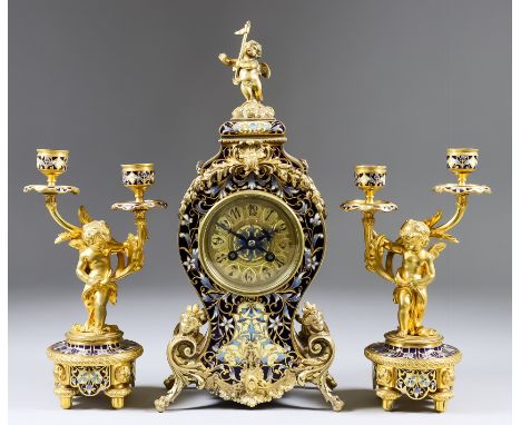 A Late 19th/Early 20th Century French Gilt Brass and Champleve Enamel Three-Piece Clock Garniture of "Louis XV" Design, retai