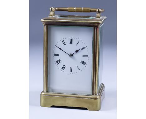 A Late 19th/Early 20th Century French Carriage Clock, the white enamel dial with Roman numerals, to the eight day two train m