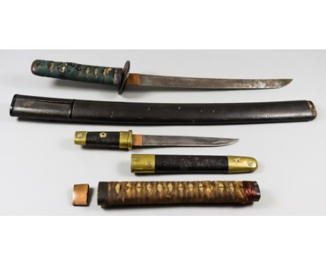 A Mixed Lot of Japanese Sword Related Items - comprising a tanto, a wakizashi scabbard, a kwaiken dagger, a katana-sized tsuk