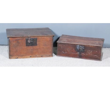 A 17th Century Oak Bible Box and an 18th Century Oak Bible Box, the 17th Century box with front carved "M M", 22ins wide x 12