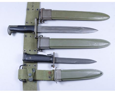 26.  A 20th Century American M8 Bayonet/Fighting Knife by Milpar &amp; Co, 6.5ins blackened steel blade, plain steel cross gu