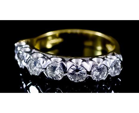 A Seven Stone Diamond Ring, Modern, in 18ct yellow gold mount, set with round brilliant cut diamonds, approximate total diamo