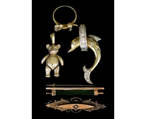 A Mixed Lot of 9ct Gold, comprising - an articulated teddy bear set with paste stones, 34mm overall, a dolphin pendant set wi