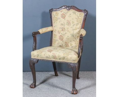 A George II Walnut Framed Open Armchair in the French Manner, the shaped and moulded showwood frame with carved leaf and bead