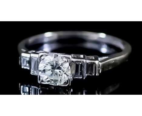 A Five Stone Diamond Ring, 20th Century, in 18ct white gold and platinum mount, the centre set with a round brilliant cut dia