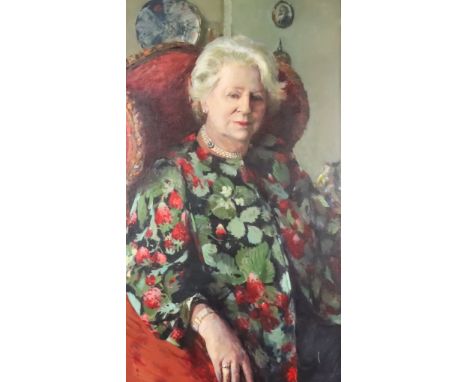 ***Jane Bond (born 1939) - Oil painting - Three quarter length portrait of Lady Doreen McIntosh wearing pearl choker, seated 