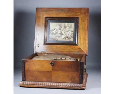 A Late 19th Century Polyphon, No. 33, to take 15.625ins diameter disc, the mechanism with twin 6.625ins and 2.25ins steel com