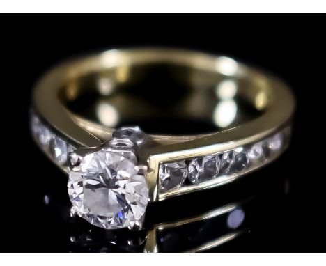 A Diamond Solitaire Ring, Modern, by Tolkowsky, in 18ct gold mount, the centre set with a round brilliant cut diamond, approx