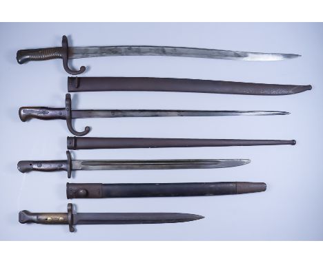 A 19th Century French St Etienne Sword Bayonet, 22ins bright steel fullered blade, brass grip, with steel scabbard, 28ins ove