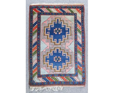 Two Turkish Rugs of Kazak Design, Modern, one woven in pastel colours with three bold geometric motifs on a light blue ground