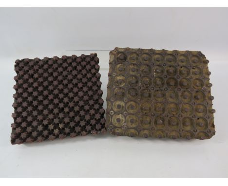 Two vintage wooden hand printing blocks.