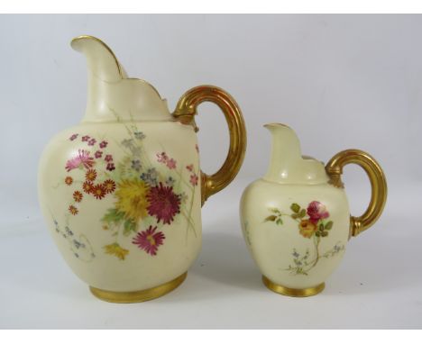 Two Antique Royal Worcester handpainted blushware jugs model number 1094, the tallest stands 8" and has a crack at the spout.