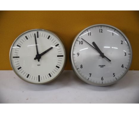 Two Vintage clocks, one by IBM, the other by Choride Gents. Largest has  of 9.5 inches. Working condition Unknown. See photos