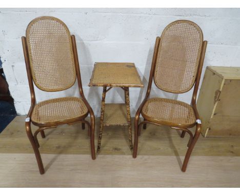 Pair of very attractive Begere bentwood chairs plus one Tiger Bamboo occasional table with shelf under. In good order. See ph