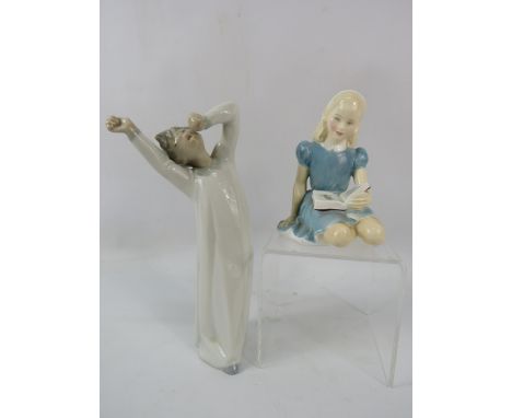 Royal Doulton figurine Alice Hn2158 and Nao figurine of a boy yawning.