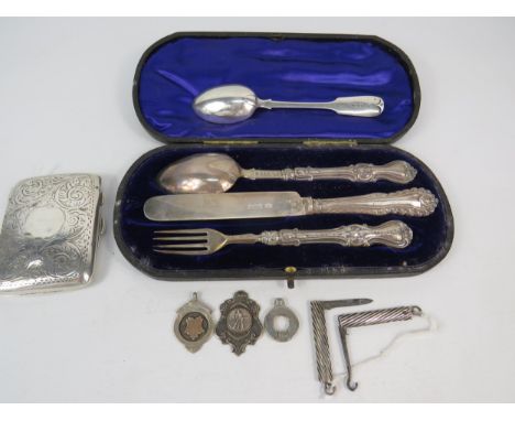 Interesting mixed Silver lot to include a cased cutlery set of knife, fork and spoon. Hallmarked for Sheffield 1906 by Mappin