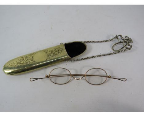 Pair of vintage gold filled glasses with a white metal case.