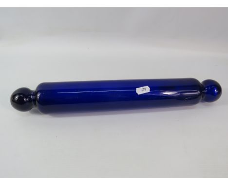 Antique Bristol blue glass rolling pin, 15 3/4" long.