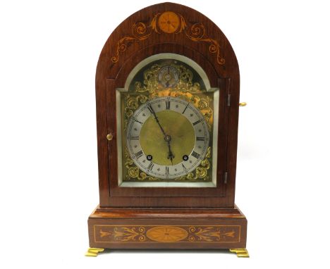 Winterhalder &amp; Hofmeier arched chiming bracket clock with inlaid marquetry, and carry handles. 14.5" tall in running orde