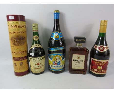Five unopend bottles of alchol including Whiskey and Disaronno.