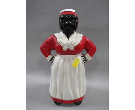 A vintage cast metal figural money bank Notice from the the-saleroom.com: These items are listed on the basis they are illust