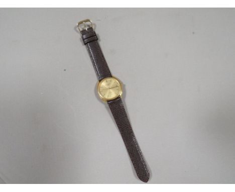 A vintage Longines gentlemen's quartz wristwatch on replacement strap 