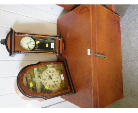 Two vintage style clocks together with a leather covered trunk 