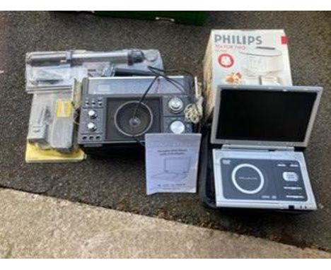 A box of electricals to include Boots projector and instructions, portable DVD payer with instructions, Workzone cordless wor