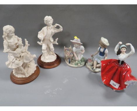 A Royal Doulton figurine Karen together with two Lladro figures of children with flowers and tow others (5) 