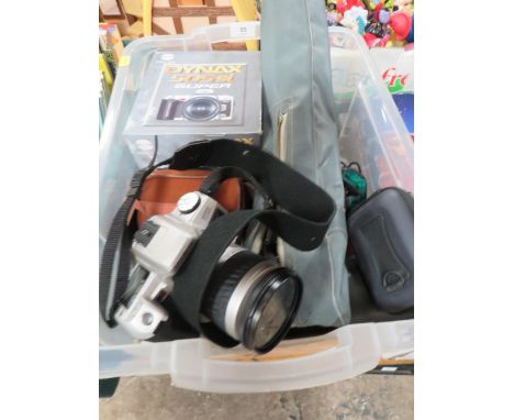 A box of assorted camera equipment to include a Minolta 505 SI super camera 