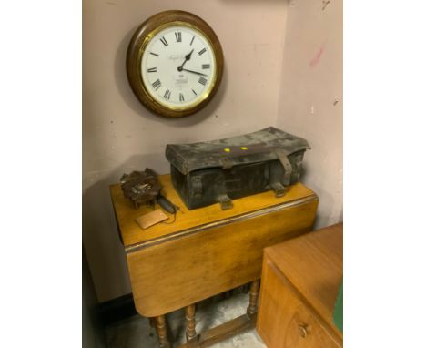 A modern wallclock together with an oak dropleaf table, a cuckoo clock, a leather case, an oak wickerseat chair and a pedesta