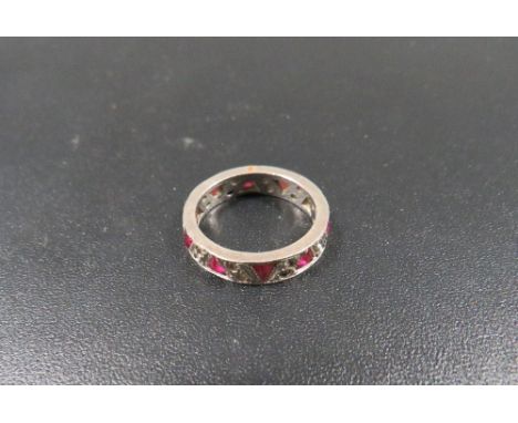 A gemset eternity ring stamped 9ct, approx. weight 3.3g 