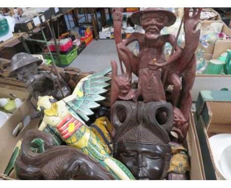 A tray of assorted treen etc. to include Oriental figures, tribal style masks etc 