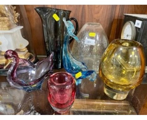 A collection of assorted glassware to include a Whitefriars water jug / pitcher, a Whitefriars style clear glass vase with bu