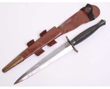 Post WW2 Fairbairn Sykes (FS) Commando Knife, one piece cast brass handle stamped with number 4 to the top. Brass cross guard