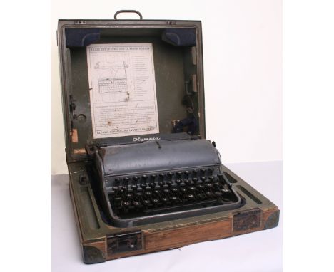 German Army / Waffen SS Field Typewriter complete with its original wooden storage box which retains much of the original gre