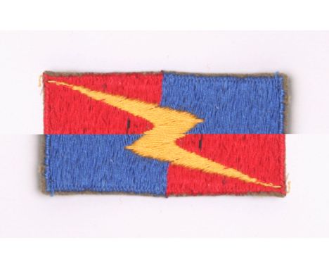 Rare 67th Anti-Tank Regiment Royal Artillery Cloth Formation Sign, equally divided red and blue rectangle with embroidered ye